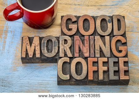 Good morning coffee banner in vintage letterpress wood type blocks with a cup of coffee