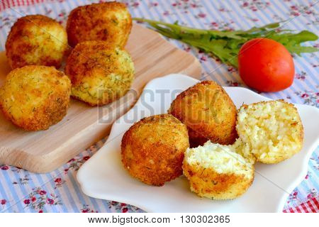 Arancini - fried rice balls. Fried rice cutlets recipe.