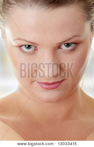 Close-up, portrait of a corpulent woman.