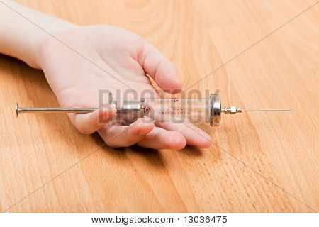 Spruta i missbrukare Hand