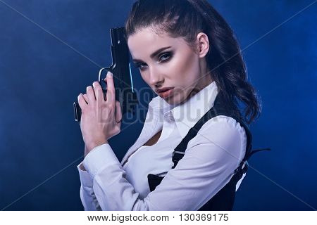 special tactics sexy woman holding up her weapon