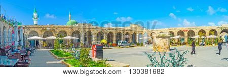 ACRE ISRAEL - FEBRUARY 20 2016: The courtyard of the historical complex of Khan e-Shu'arda with cozy cafes of local cuisine on February 20 in Acre.