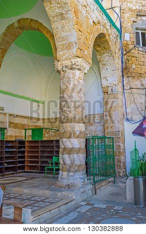 ACRE ISRAEL - FEBRUARY 20 2016: The old carved column in the courtyard of E-Zaitune Mosque on February 20 in Acre.