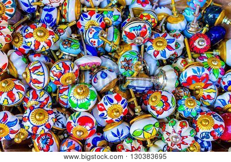 The handmade porcelain handles with the floral patterns are the best souvenirs from Jaffa flea market Tel Aviv Israel.