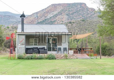 BAVIAANSKLOOF SOUTH AFRICA - MARCH 6 2016: A small roadstall in the Baviaanskloof (baboon valley) on a rainy day