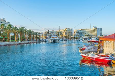 EILAT ISRAEL - FEBRUARY 23 2016: The scenic Lagoona of the luxury resort is full of yachts and pleasure boats on February 23 in Eilat.