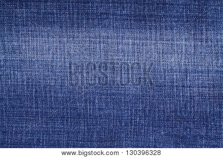 Texture of blue jeans background blue  worn