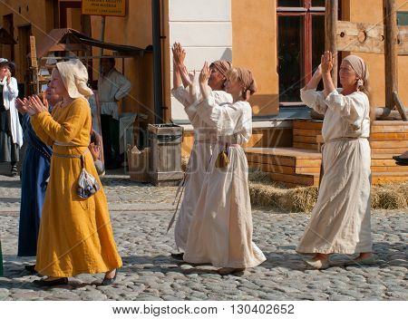 TURKU FINLAND 30 JUNE: The Medieval Market of Turku is historical reenactment event and includes a handicrafts market with participants garbed in period costumes on june 30 2013 in Turku Finland.