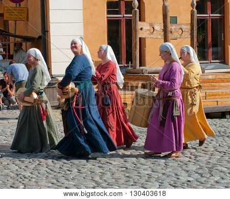TURKU FINLAND 30 JUNE: The Medieval Market of Turku is historical reenactment event and includes a handicrafts market with participants garbed in period costumes on june 30 2013 in Turku Finland.