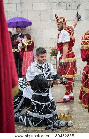 Perast, Montenegro - May 15, 2016: Shooting The Kokot (rooster) Celebration. Celebrates The Liberati
