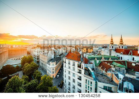 Panoramic cityscape view on Vienna city with Mariahilfer church towers on the sunset in Austria