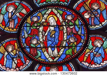 PARIS, FRANCE - MAY 31, 2015 Virgin Mary Angels Stained Glass Notre Dame Cathedral Paris France. Notre Dame was built between 1163 and 1250AD.