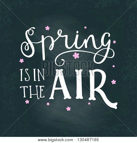 Vector lettering illustration. Spring is in the air. Calligraphy and lettering poster or postcard. Chalk board design. Spring lettering quote card. Concept composition on blackboard