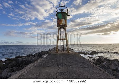 Jetty And Lighthouse In Saint-pierre, La Reunion Island