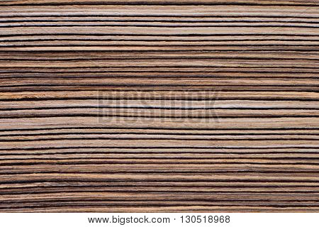 Texture of rich grain striped zebrano veneer