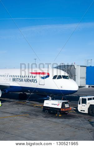 Dublin Ireland - 01 February 2015: British Airways passenger planes stand at their gates under dark skies at Dublin Airport Ireland