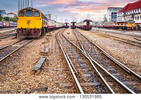 orange train diesel locomotive on bangkok railway station thailand