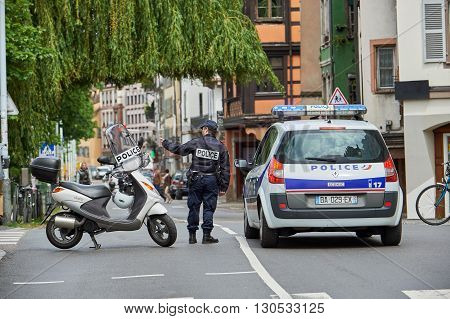 Police Officer Securing Road