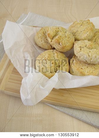 Homemade baking soda rolls on greaseproof paper