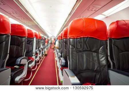 KUALA LUMPUR, MALAYSIA - MAY 02, 2014: interior of AirAsia Airbus A320-200. AirAsia Berhad is a Malaysian low-cost airline headquartered near Kuala Lumpur, Malaysia
