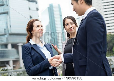 Business people hand shaking