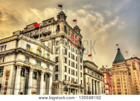 Shanghai, China - May 06, 2016: The North China Daily News Building on the Bund riverside. The building is occupied by an insurance company, AIA