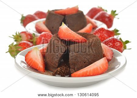 Chocolate fondant with strawberries on a white background