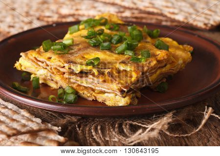 Matzo Fried With Eggs And Green Onions - Matzah Brei Close-up. Horizontal