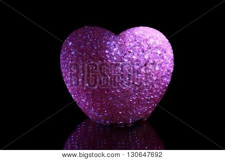 Pink love heart in black background dark