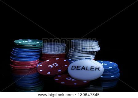 gambling chips on the black background casino