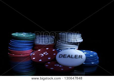 gambling chips on the black background casino