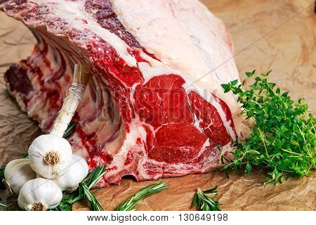 Fresh Raw Beef bone rib roughly choppid. with herbs and seasoning