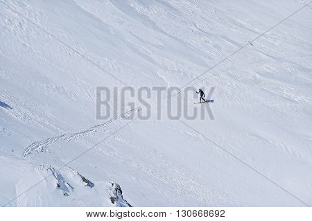 FAGARAS ROMANIA - MARCH 5: Ski mountaineer competes during the Ski Mountaineering National Competition in Fagaras Mountains Carpathian Range on March 5 2016 in Romania.
