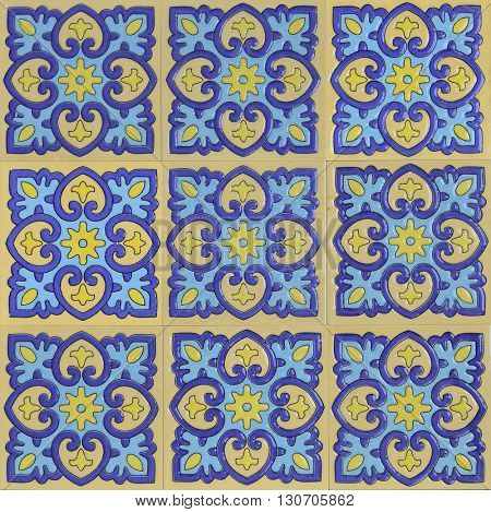 Typical Arabic decorative patterned tiles. Islamic architectural details.