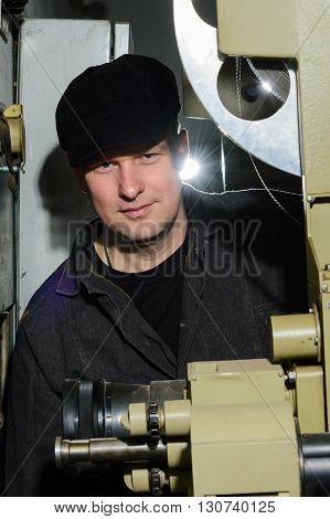 Projectionist At Work In The Room