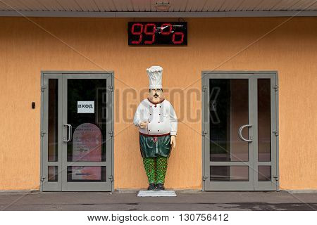 Moscow Russia - May 21 2016: Statue of restaurant chefs. Entrance to the coffee. Moisture Measuring Meter