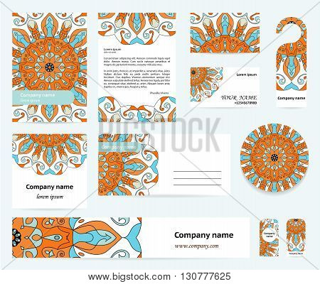 Stationery template design with mandalas motif in blue and orange colors. Documentation for business.