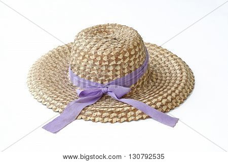 Closeup A traveling  straw hat on white background