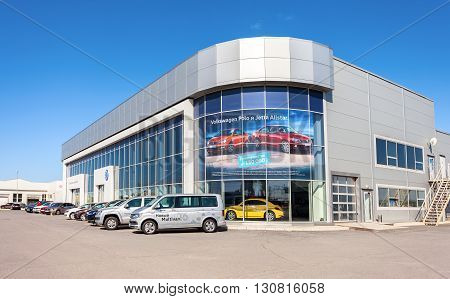 SAMARA RUSSIA - MAY 14 2016: New cars parked up near the office building of official dealer Volkswagen. Volkswagen Group is the biggest German automaker