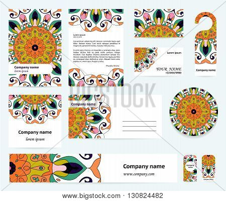 Stationery template design with mandalas in blue orange green and pink colors. Documentation for business.