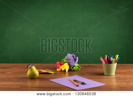 Back to school concepty with clear blackboard background, desk, items