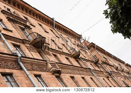 A beautifully built old historical building on Independence Avenue on a bright day. Every balcony is decorated in most houses and the architecture is simply marvellous. Minsk was rebuilt 90 after the German Plunderings in WWII