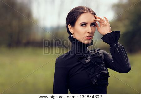 Portrait of a Gothic Queen Outside Wearing Diamond Earrings