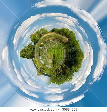 Tiny planet of Beautiful summer rural landscape with small lagoon. Rural landscape with pond. Spring landscape. Green czech countryside. Beautiful highland vysocina european countryside