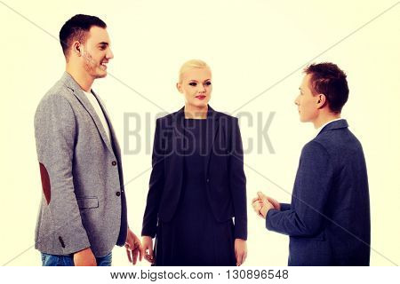 Happy business team talking together 