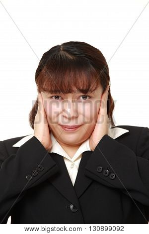 Asian businesswoman suffers from noise on white background