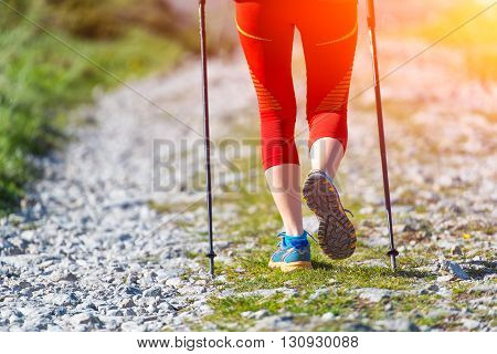 Details Of Walking On Mountain Road With Sticks