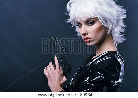 special tactics sexy woman holding up her weapon