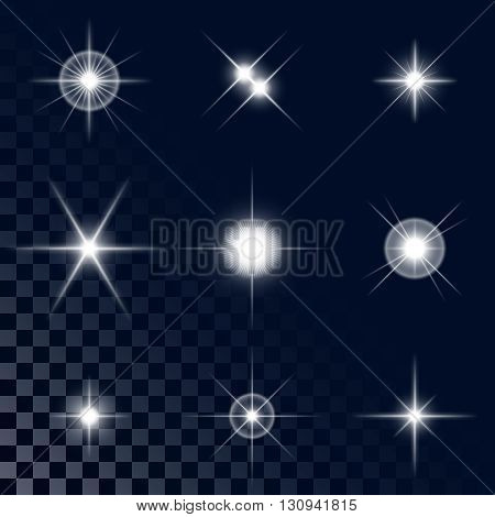 Set of the realistic sparkling white star fires and flashes on a transparent background a vector illustration