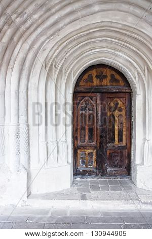 detail of an old church or castle door. Old wooden door